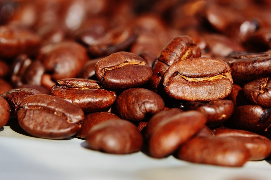 Close view of whole coffee beans. | Coffee shops near Little Rock, AR | Crain  Automotive Team Collision
